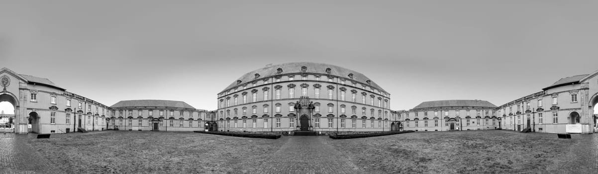 Osnabrueck, Germany - February 18, 2023: panoramic view to scenic castle in Osnabrueck, Germany in black and white.