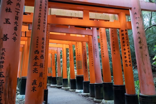 Kyoto, Japan - March 24, 2023: Columns at the iconic Fushimi Inari Shrine