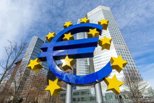 Frankfurt, Germany - March 28, 2023: the Euro sign in Frankfurt in front of skyscraper in Frankfurt