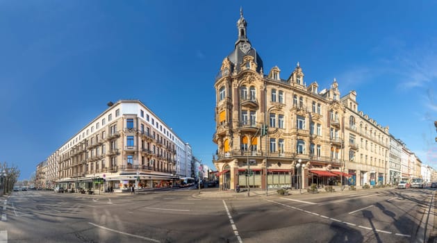 Wiesbaden, Germany - February 21, 2023: view to historic buildings at Wilhelmstrasse - engl: wilhelm street in Wiesdaden. Wilhelm street is the classicistical shopping street in Wiesbaden.