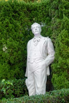 Nagasaki,  Japan - April 1, 2023: Statue in glover Garden of composer Giacomo Puccini, famous for opera Madame Butterfly in Nagasaki. Created by sculptor Gilbert Lebigre in 1996.