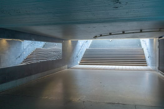 pedestrian subway in a germany city Wiesbaden with blue light from advertising