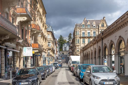 Wiesbaden, Germany - March 26, 2023: view to historic Saalgasse - engl hall street in Wiesbaden. The houses are all built in the 19th century in Wilhelminian style  and well restored.
