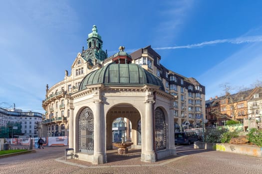 Wiesbaden, Germany - April 4, 2023: The Kochbrunnen (in German: boil fountain) in Wiesbaden is the most famous hot spring in city. It is a sodium chloride hot spring.
