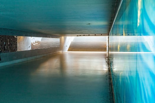 pedestrian subway in a germany city Wiesbaden with blue light from advertising