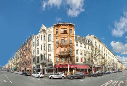 Wiesbaden, Germany - March 25, 2023: view to historic Taunusstrasse - engl Taunus street in Wiesbaden. The houses are all built in the 19th century and all are well restored.