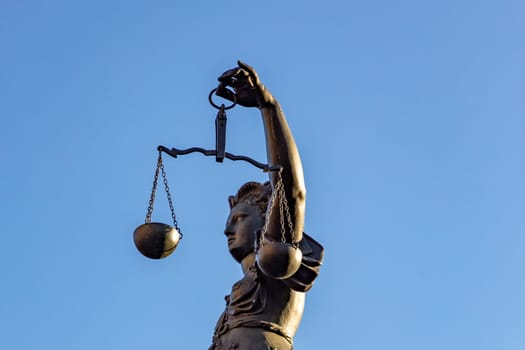 Frankfurt, Germany - February 28, 2023: Statue of Lady Justice (Justitia) in Frankfurt, Germany.