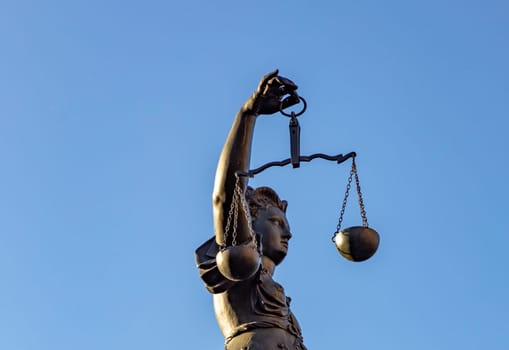 Frankfurt, Germany - February 28, 2023: Statue of Lady Justice (Justitia) in Frankfurt, Germany.
