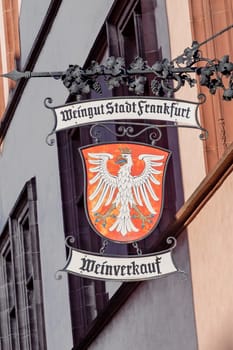 Frankfurt, Germany - February 28, 2023: coat of arms of the winery in Frankfurt, Germany. Weingut Frankfurt, Weinverkauf in engl: Winery Frankfurt, selling Wine.