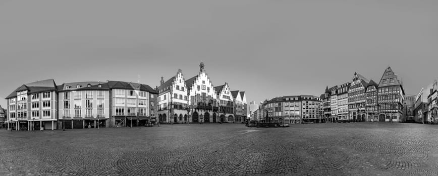 Frankfurt, Germany - February 28, 2023: scenic view to Roemer square in Frankfurt with historic city hall and half timbered historic houses.