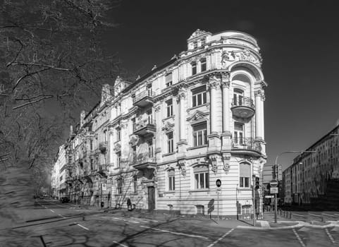 Wiesbaden, Germany - March 2, 2023: people at Kaiser Friedrich Ring - engl: King Friedrich circle - with its old scenic facade of the 19th century in classicistic and Art Nouveau style.