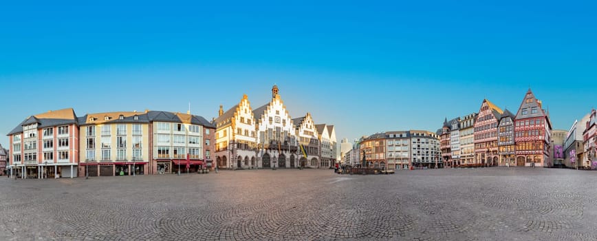 Frankfurt, Germany - February 28, 2023: scenic view to Roemer square in Frankfurt with historic city hall and half timbered historic houses.
