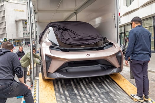 Frankfurt, Germany - March 21, 2023: NIO EVE Concept Self-driving Electric Car  is unloaded from a van to be placed in NIO showroom in Frankfurt.