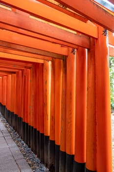 Kyoto, Japan - March 24, 2023: Columns at the iconic Fushimi Inari Shrine