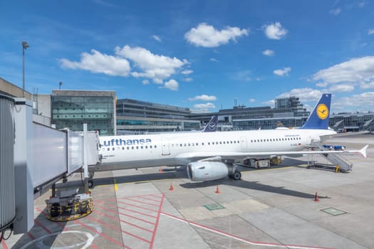 Frankfurt, Germany - April 30, 2023: Lufthansa airbus aircraft at the gate of Terminal 1, the Lufthansa and star alliance terminal.