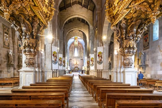 Braga, Portugal - May 1, 2023: High Choir Golden Decoration and Organs at Sé de Braga Cathedral Interior - Braga, Portugal