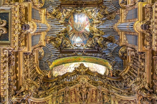 Braga, Portugal - May 1, 2023: High Choir Golden Decoration and Organs at Sé de Braga Cathedral Interior - Braga, Portugal