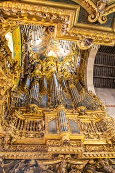 Braga, Portugal - May 1, 2023: High Choir Golden Decoration and Organs at Sé de Braga Cathedral Interior - Braga, Portugal