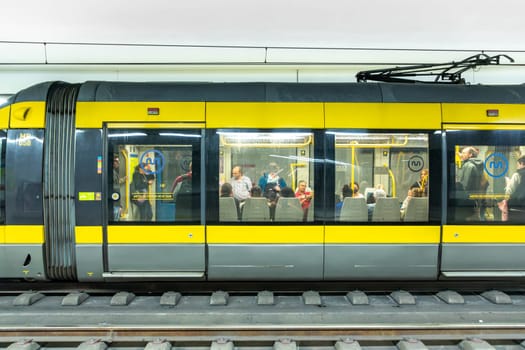 Porto, Portugal - May 3, 2023: metro stops at metro station faria guimaraes with modern metro in Porto, Portugal.