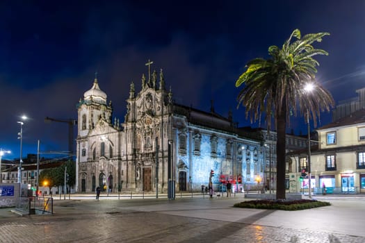 Porto, Portugal - May 4, 2023: Fountain and the baroque Igreja do Carmo, Church of the Song, in Porto.