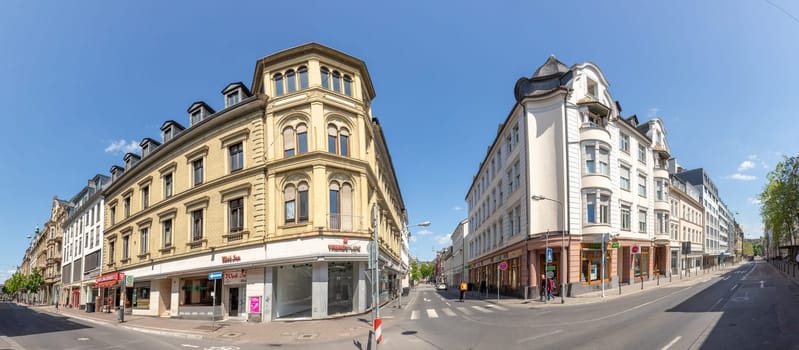 Wiesbaden, Germany - May 18, 2023: view to the old historic houses in the shopping street Friedrichstrasse in Wiesbaden with old facades..