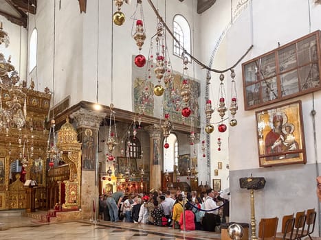 Bethlehem, Israel - May 19, 2023: people visit the church of Nativity in Jerusalem.