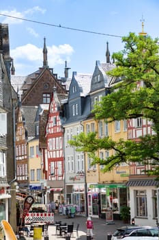 Montabaur, Germany - June 15, 2023: people enjoy visiting old town of Montabaur with lovingly restored half-timbered buildings from the 16th and 17th centuries.