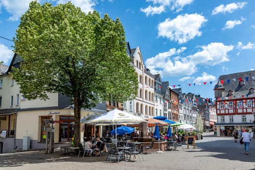 Montabaur, Germany - June 15, 2023: people enjoy visiting old town of Montabaur with lovingly restored half-timbered buildings from the 16th and 17th centuries.
