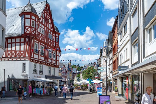 Montabaur, Germany - June 15, 2023: people enjoy visiting old town of Montabaur with lovingly restored half-timbered buildings from the 16th and 17th centuries.