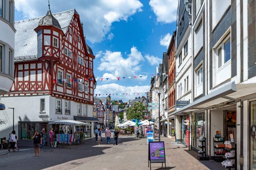 Montabaur, Germany - June 15, 2023: people enjoy visiting old town of Montabaur with lovingly restored half-timbered buildings from the 16th and 17th centuries.