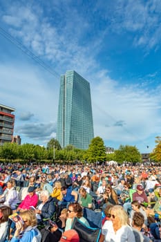 Frankfurt, Germany - August 31, 2023: people enjoy the open air festival with the HR synphony orchestra and big band at the Weseler werft in Frankfurt.