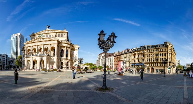 Frankfurt, Germany - October 10, 2023: view of old opera house and fountain with other historic houses at the Zeil in Frankfurt, Germany