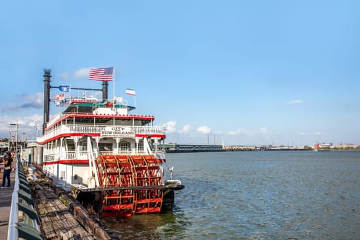 New Orleans, USA - October 24, 2023: Steamboat city of new orleans at the pier  at Mississippi River. The steamboat is still in Operation for touristic events.