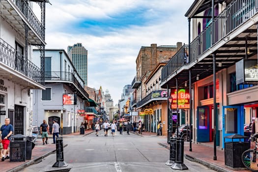 New Orleans, USA - October 24, 2023: Pubs and bars with neon lights in the French Quarter, downtown New Orleans.