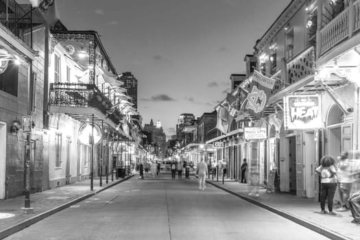 New Orleans, USA - October 24, 2023: Pubs and bars with neon lights in the French Quarter, downtown New Orleans.