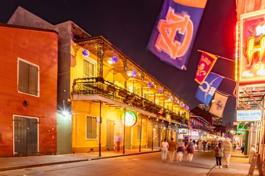 New Orleans, USA - October 24, 2023: Pubs and bars with neon lights in the French Quarter, downtown New Orleans.