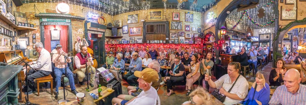 New Orleans  USA - October 25, 2023: listening to a band in the Jax club Frittzels at the Buorbon street on New Orleans by night.