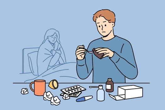 Man helps woman recover by pouring medicinal syrup and preparing flu pills, standing near bed with sick wife. Guy caregiver takes care of sick sister suffering from infection or virus.
