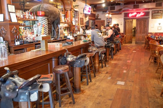 Fort Worth, USA - November 5, 2023: old classic saloon with cowboy decoration at stockyards hotel in Fort Worth.