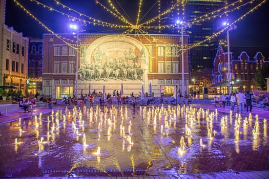 Fort Worth, Texas - November 5, 2023: people enjoy the illumination by night at sundance plaza in downtown Fort Worth.