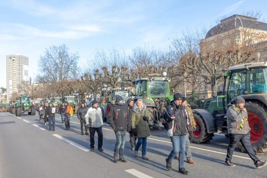 Wiesbaden, Germany - January 8, 2024: farmer with their tractors demonstrate for cutting down the price for diesel fuel and against the german government.