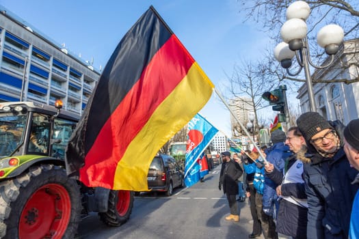 Wiesbaden, Germany - January 8, 2024: farmer with their tractors demonstrate for cutting down the price for diesel fuel and against the german government.