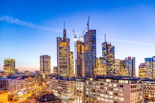 Frankfurt, Germany - February 2, 2024: scenic aerial view to skyline of Frankfurt with skyscraper in dawn