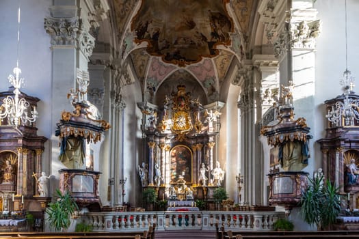 Amorbach, Germany - January 27, 2024: the catholic church St. Gangolf was built by architect Alexander Jakob Schmitt in baroque stile and is famous for its beauty.