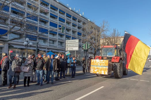 Wiesbaden, Germany - January 8, 2024: farmer with their tractors demonstrate for cutting down the price for diesel fuel and against the german government.