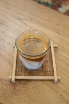 Coffee time with dirty coffee glass on table, stock photo