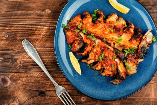 Baked cut mackerel fish in soy marinade. Top view. Copy space.