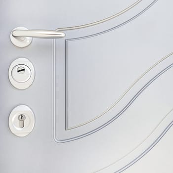 Details Modern Door. Stylish front door. Close-up.