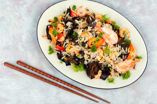 Shrimp fried rice serves on the dish. Thailand popular meal.