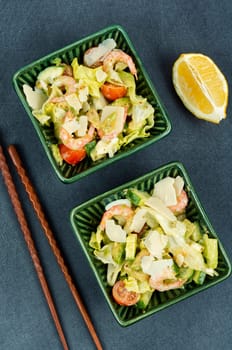 Asian salad with shrimp,prawns avocado and tomato in a bowl. Healthy food concept.